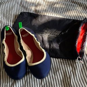 Navy blue Bally flats with travel pouch